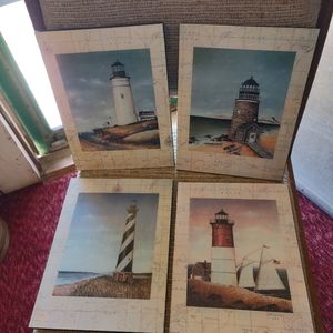 SET OF FOUR LIGHT HOUSE WALL PICTURES.